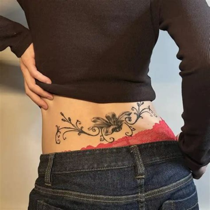 Stylish Lower Back Tattoos: Unveil Your Femininity